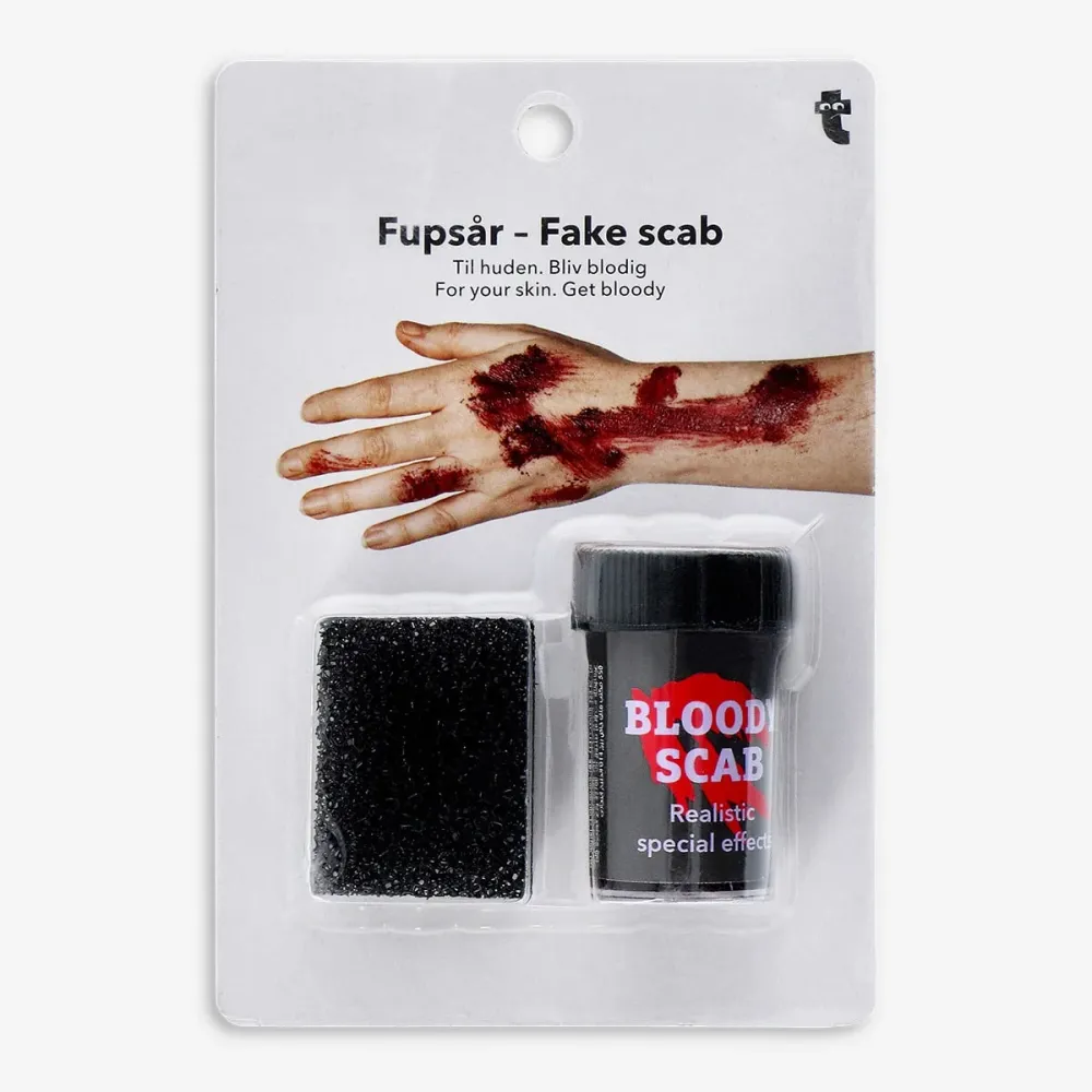 Fake scab iholle väärennetyllä verellä setin kanssa